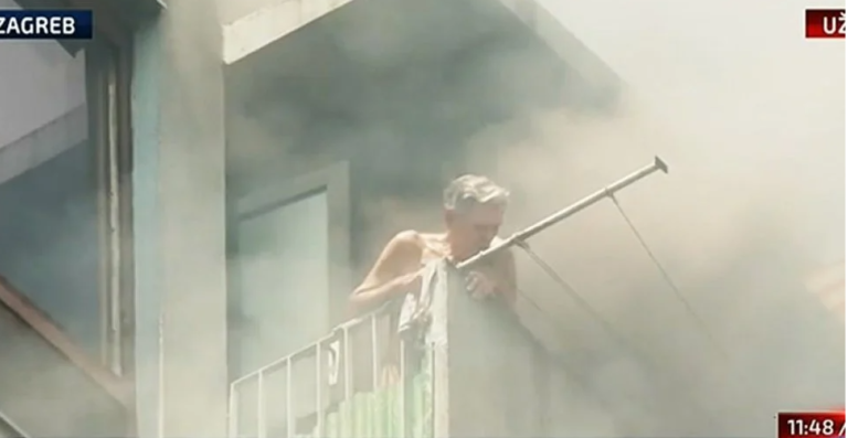 (FOTO-VIDEO) UŽAS ! Požar u Novom Zagrebu, gori zgrada, spašen čovjek iz gustog dima na balkonu, stanari u panici pobjegli vani. Požar se proširio…